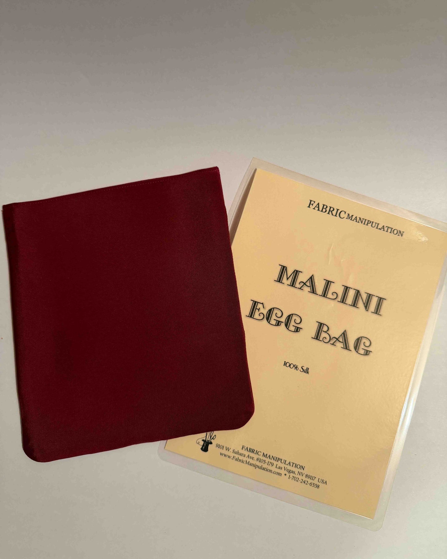 For sale: Malini Egg Bag by Lynetta Welch (Fabric Manipulation) Color: Maroon